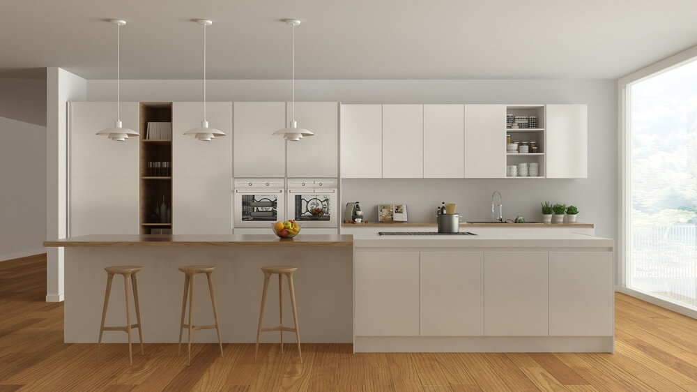 A rendered image of white kitchen cabinets and an island in a white painted room with a large window
